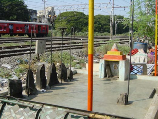 Vidya Kamat_Tribal gods by railway tracks_goregaon west.jpg